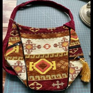 Beautiful fabric multifaceted bag in bright unique design & colors.